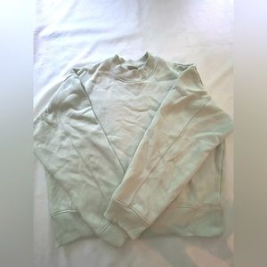 A new day, bluish green almost light teal, scoop neck sweater.